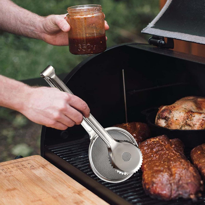 Stainless steel deep frying tong.