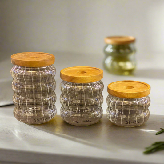 Glass jars and wooden lid