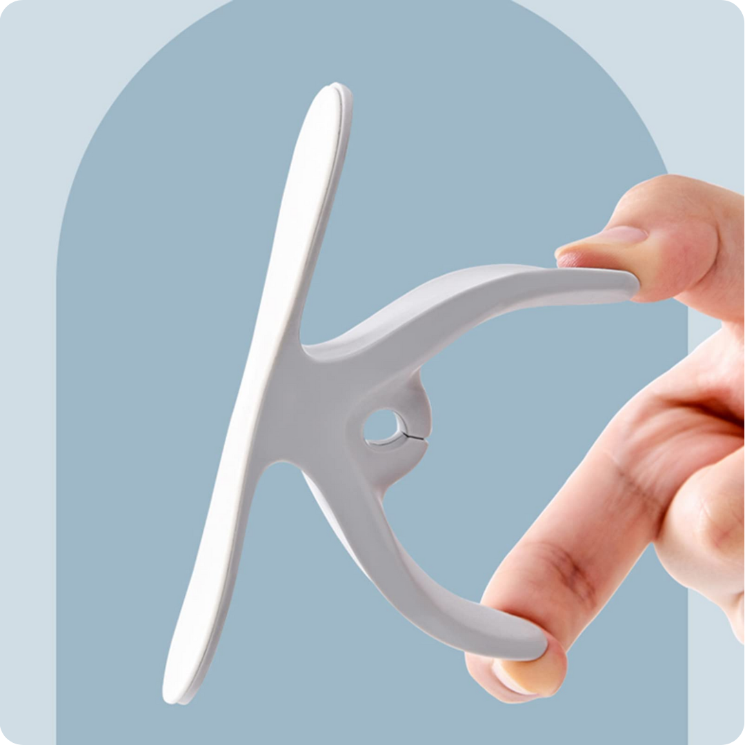 Cord organizer holding juicer cable neatly wound