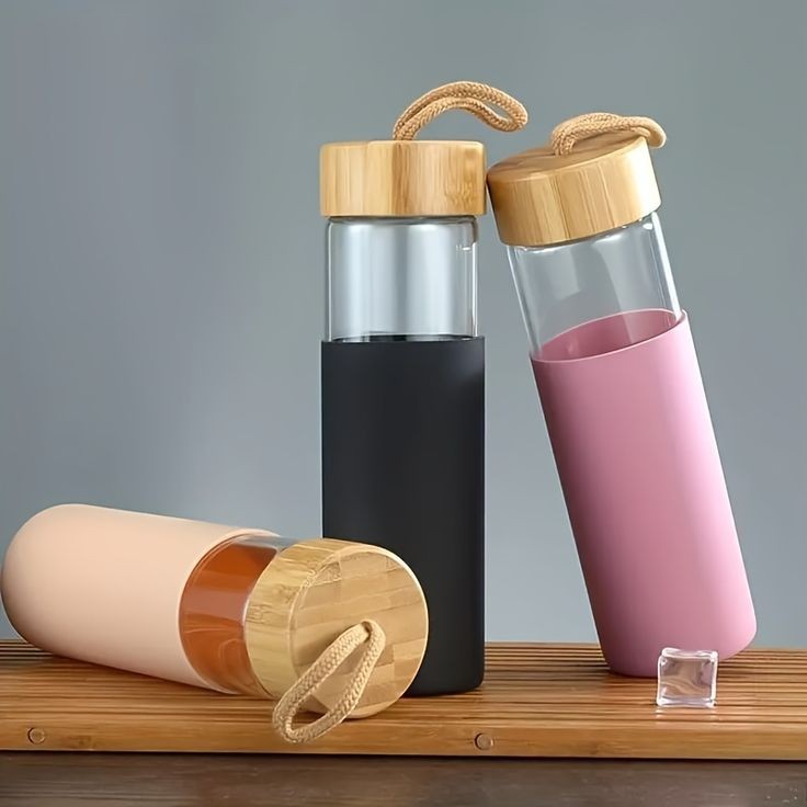 Glass Water Bottle with Wood Lid and Silicone Sleeve