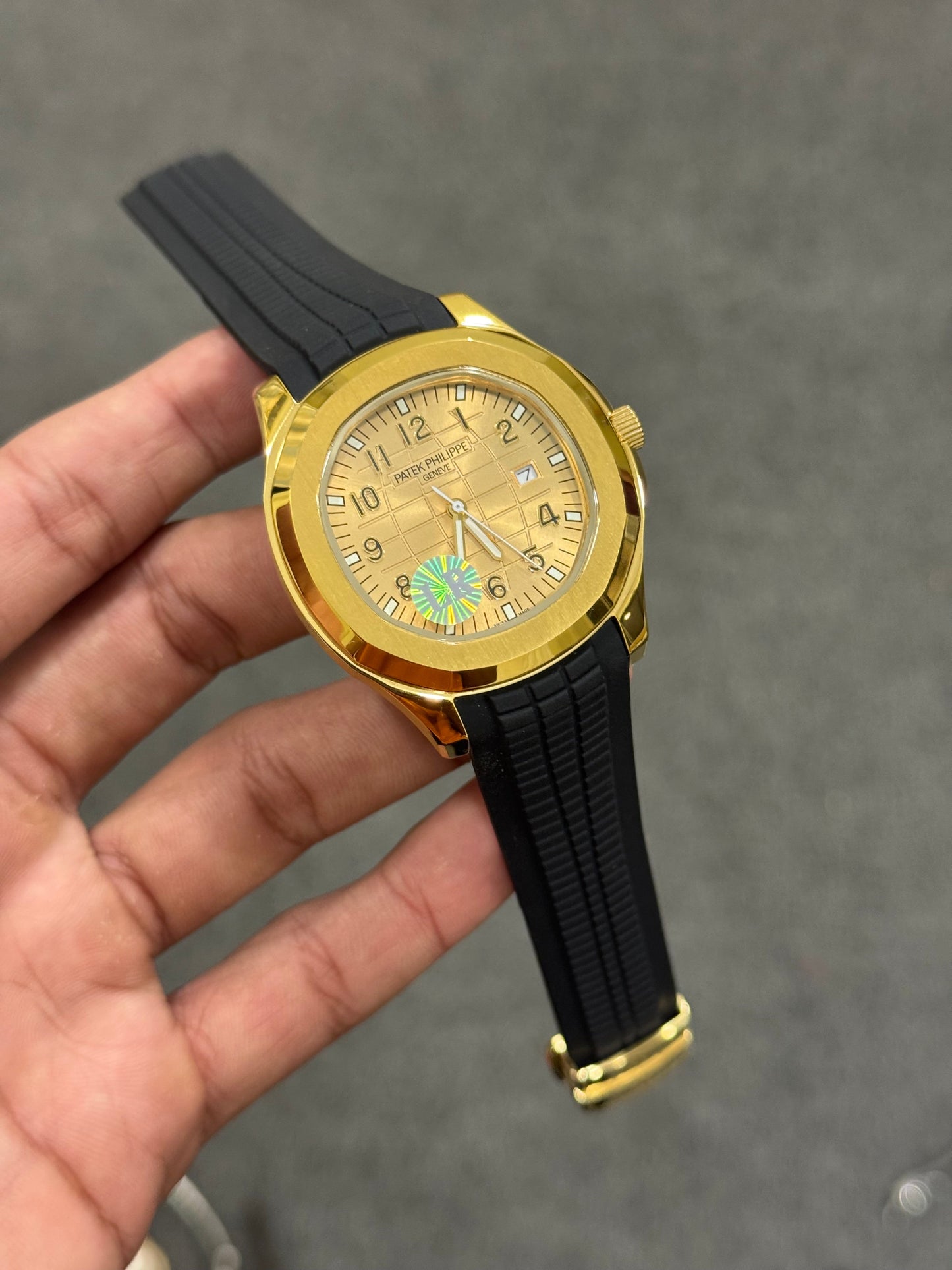 Aquanaut Quartz | Golden case | Golden dial | Black strap