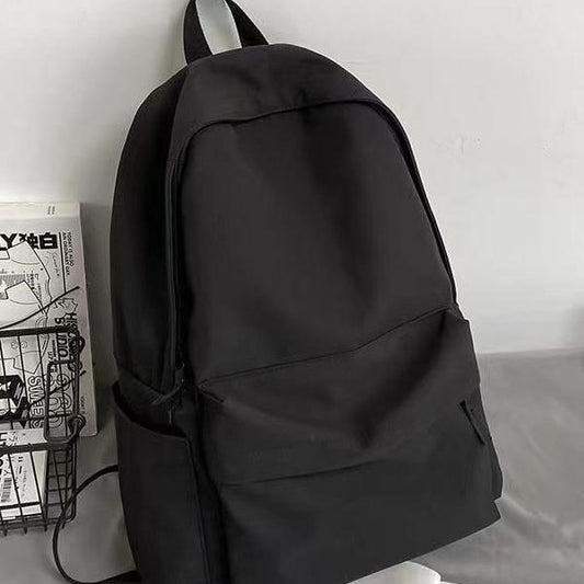 Classic Unisex Pocket Front Backpack with Large Capacity, Laptop Compartment, and Minimalist Design